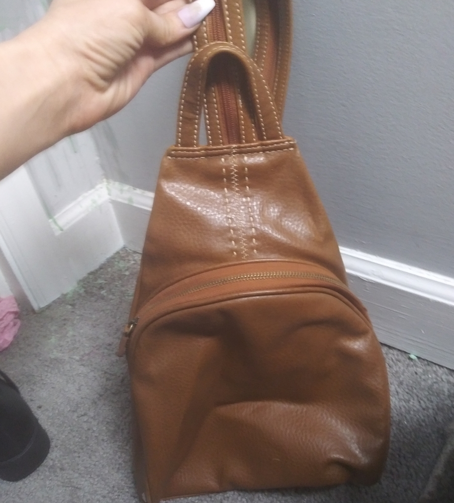Brown leather backpack and wallet combo